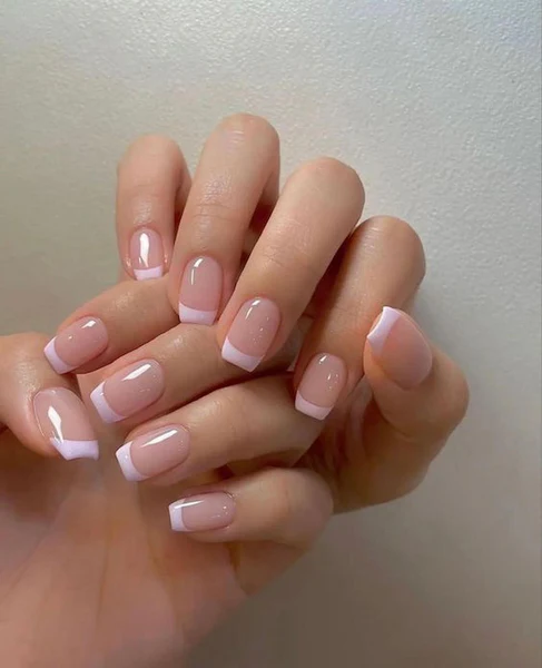 someone_s-hand-with-french-tip-nails-short-orange-brown-orange-add-short-add-short-add-short-add-short-add-short-short_600x600